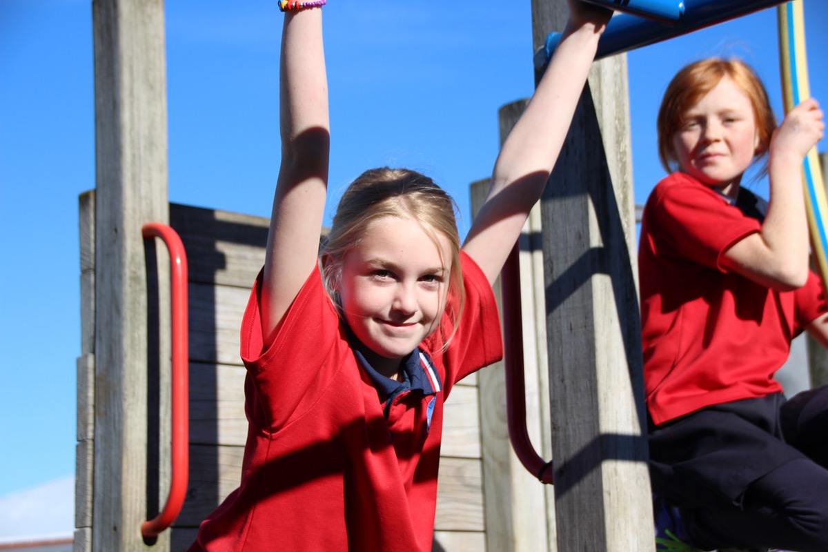 browns bay school students on jungle gym